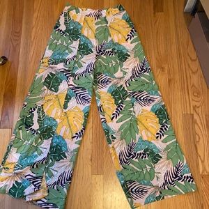 Pink tropical leaf print tulip hem pants